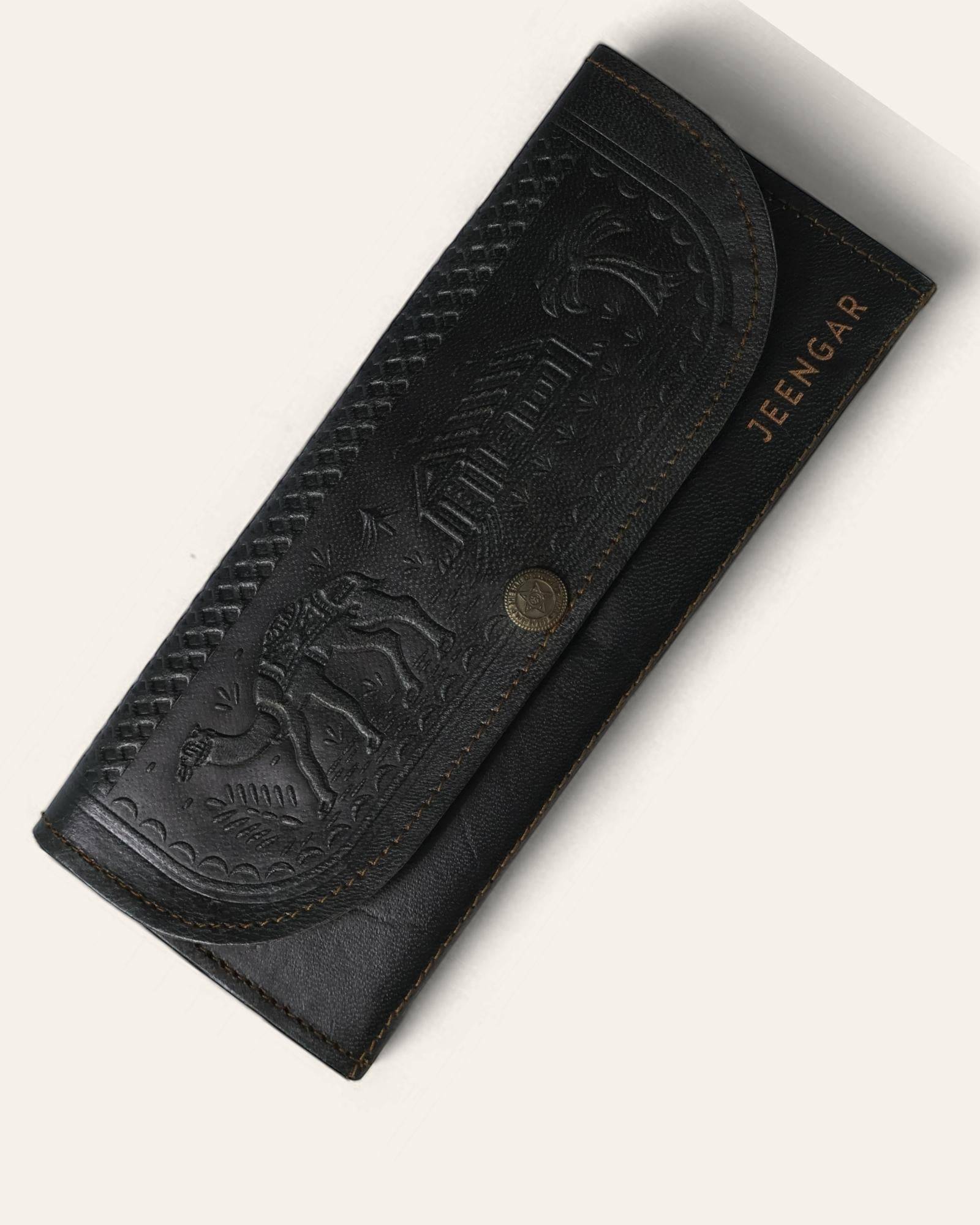 The Gangaur Clutch in Dark Olive — hand-embossed leather clutch, front view