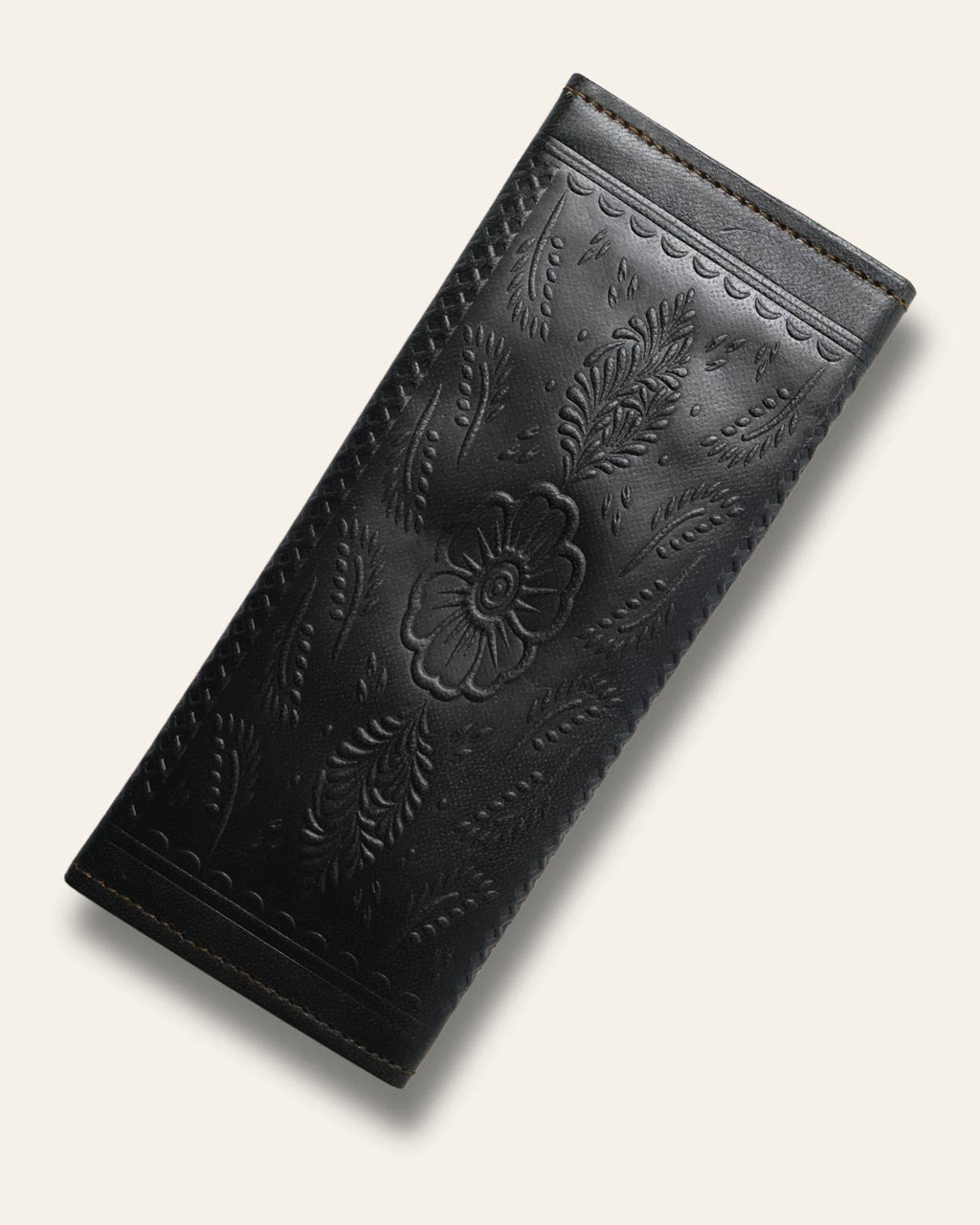 The Gangaur Clutch in Dark Olive — embossed desert motif on real leather