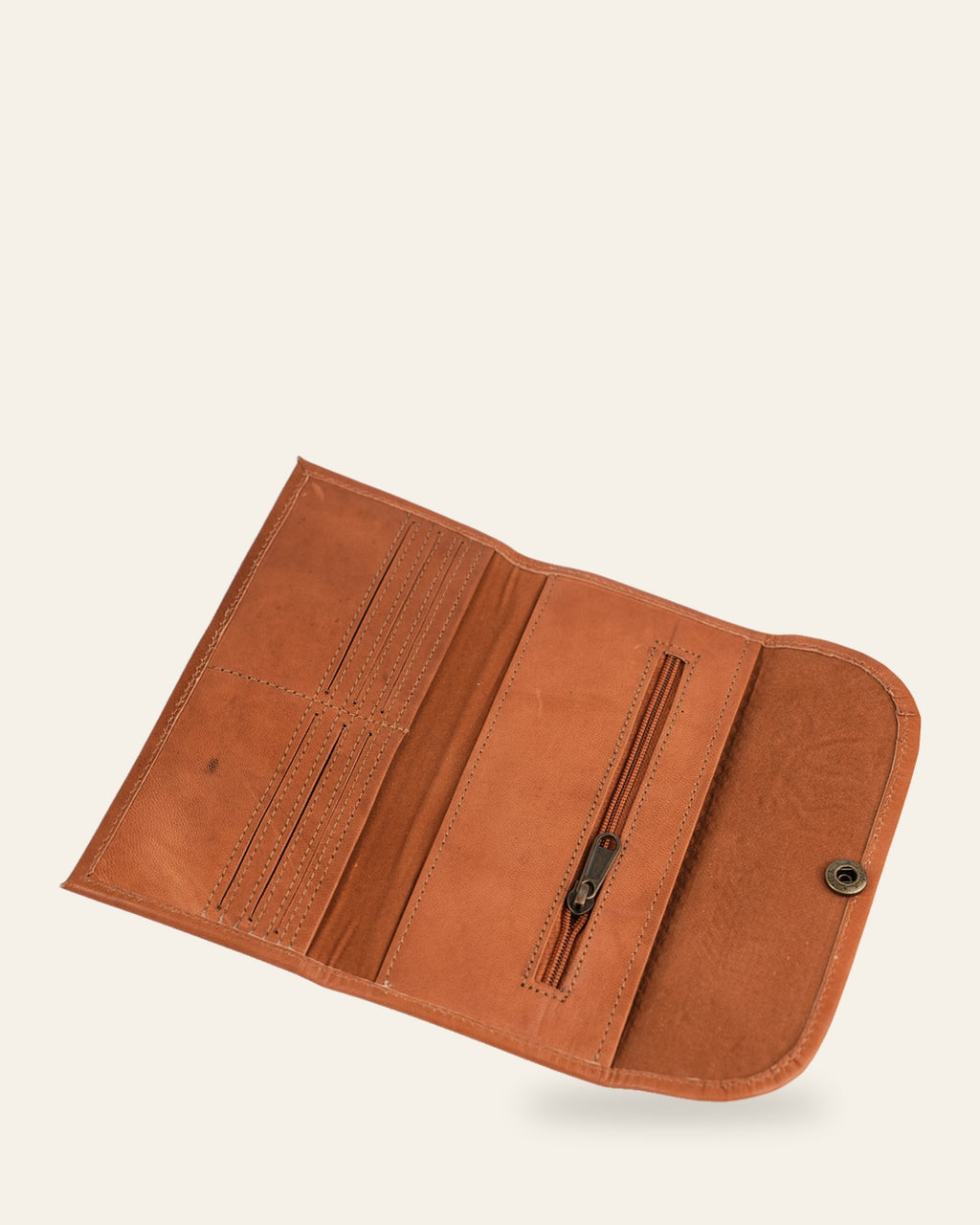 The Gangaur Clutch in Tan — open interior with card slots and zip pocket