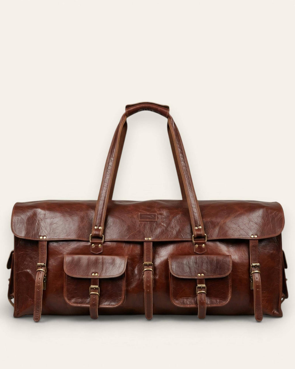 The Bikaner Cricket Holdall — handcrafted leather cricket kit bag in cherry brown, front view