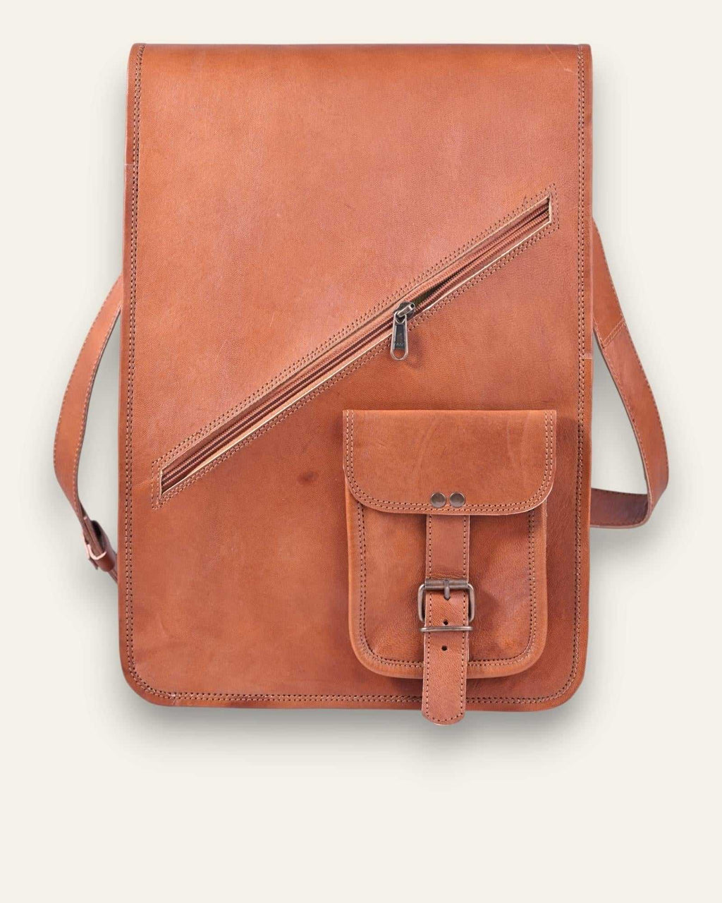 The Bundi Crossbody Bag — tall tan goat leather bag with diagonal zip, front view