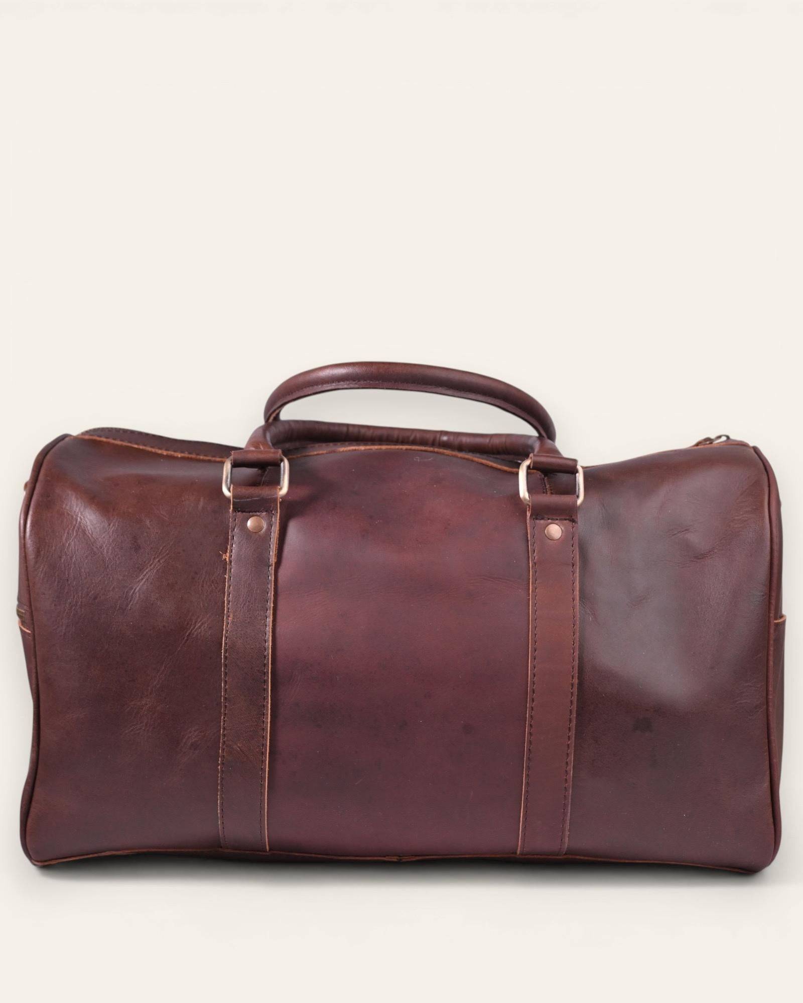 The Shekhawati Weekender in Dark Brown — rugged Hunter leather duffel bag, detail
