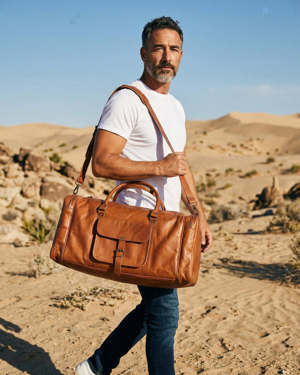 The Ranthambore Weekender — sleek golden-tan leather travel duffle