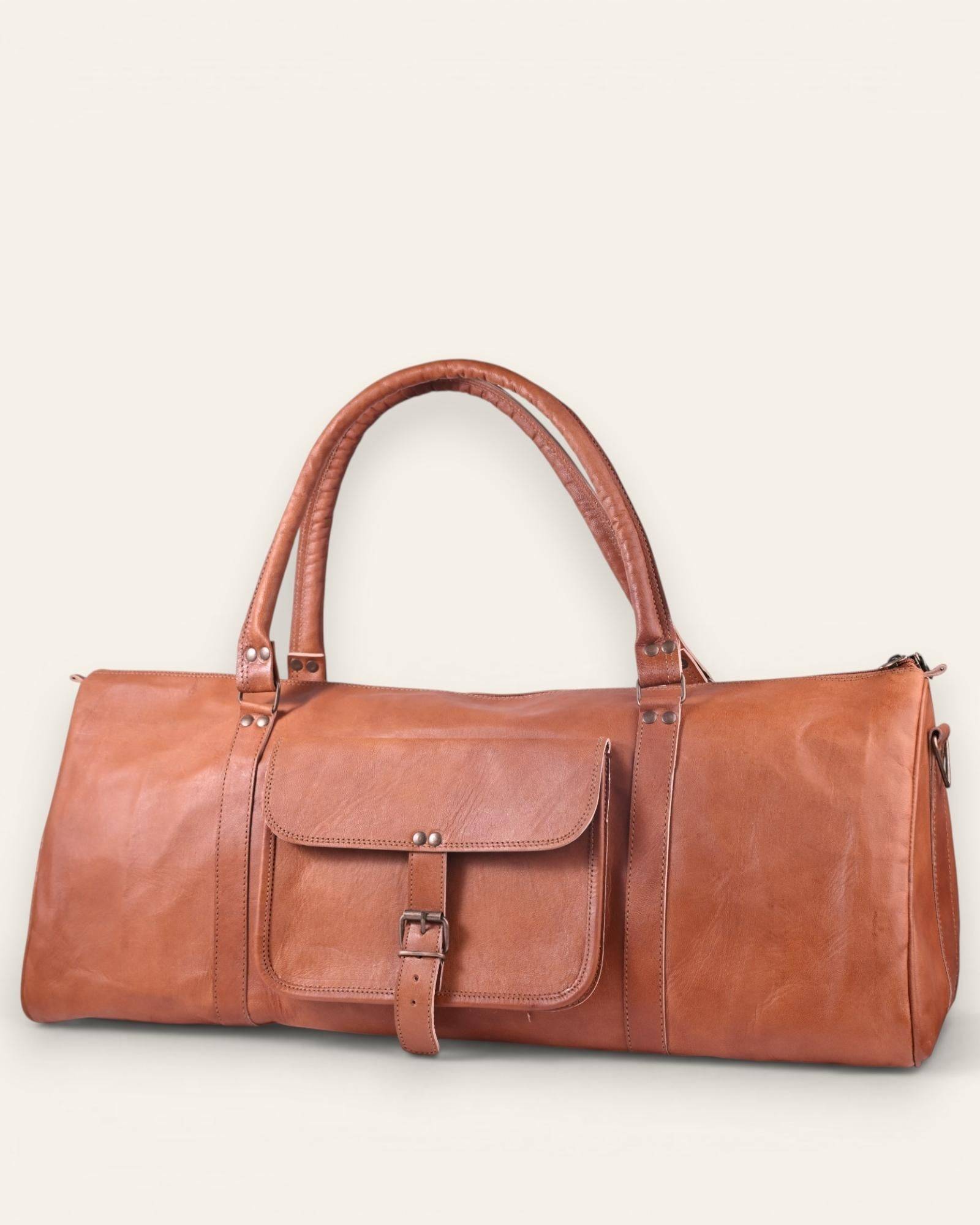 The Amer Weekender — handcrafted tan leather duffel bag by Jeengar, front view