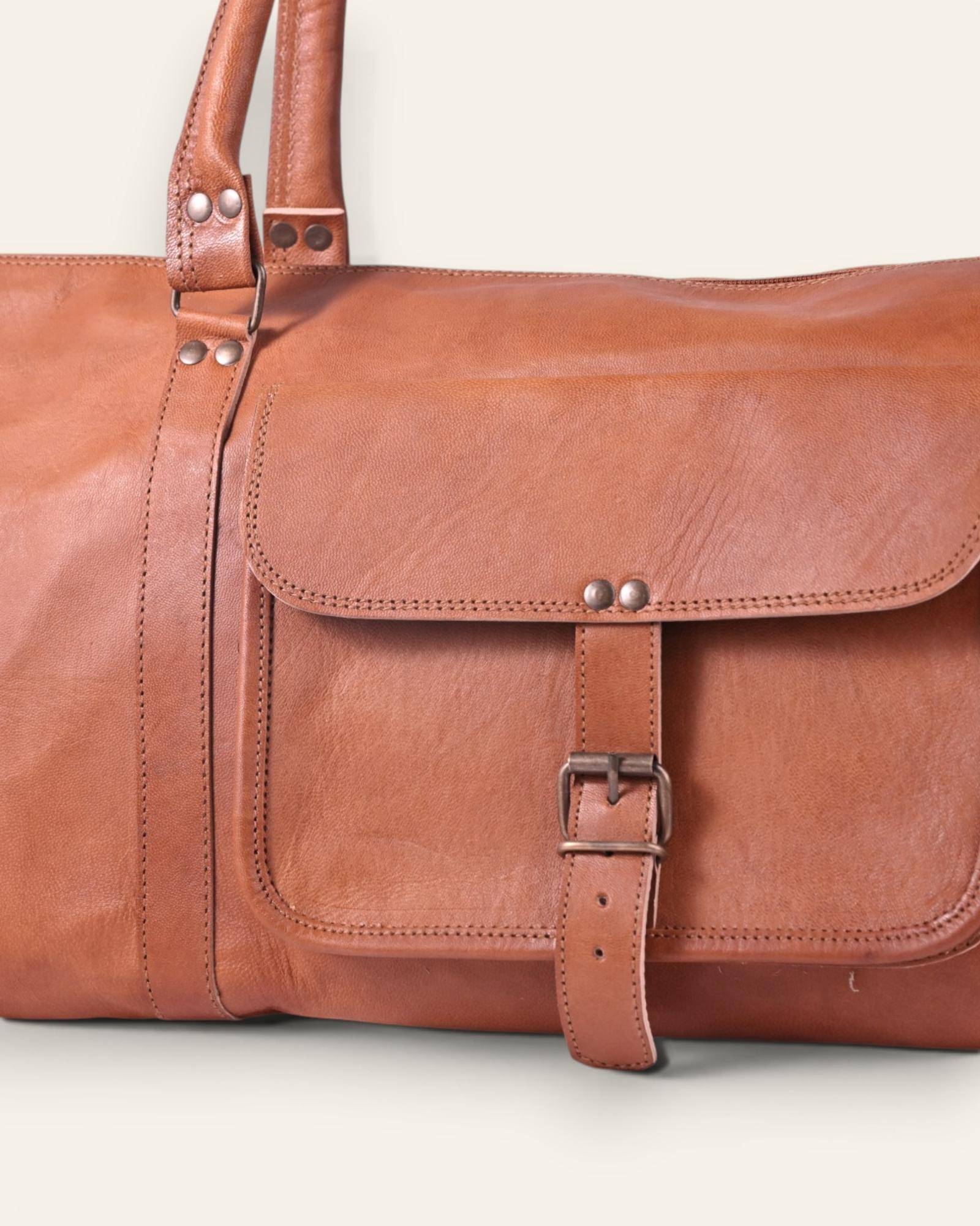 The Amer Weekender — handcrafted leather travel duffel, hardware detail