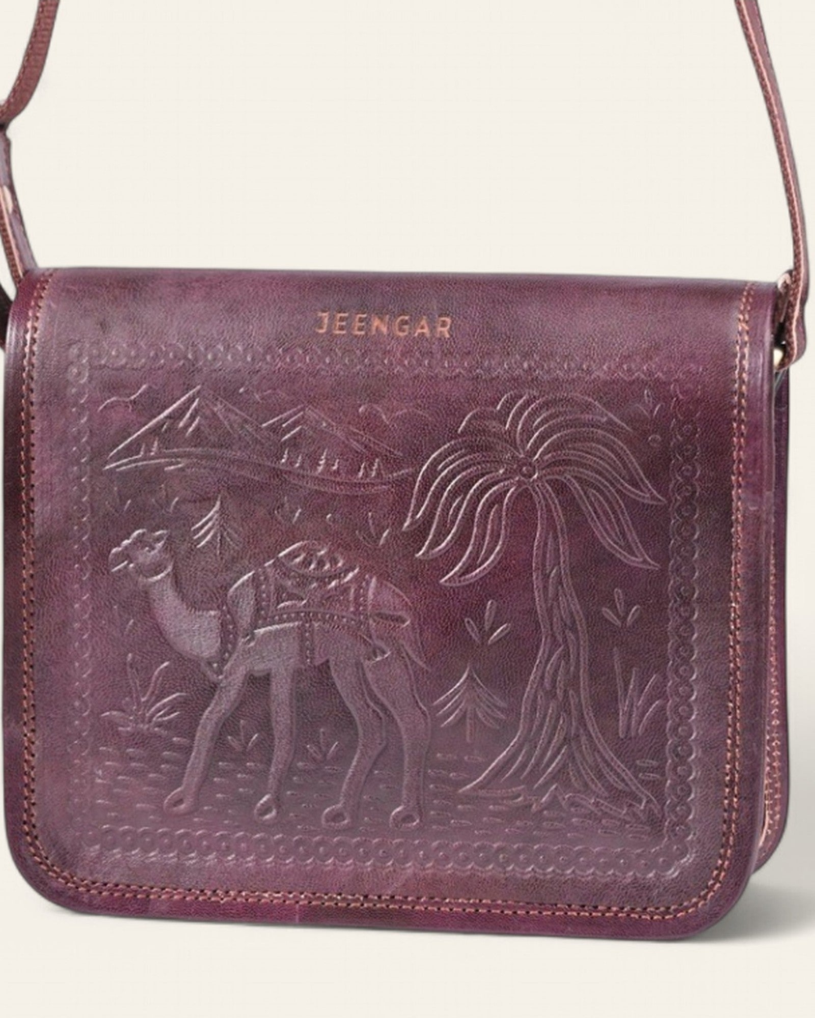 The Jaisalmer Sling in Cherry - hanging view with adjustable leather strap