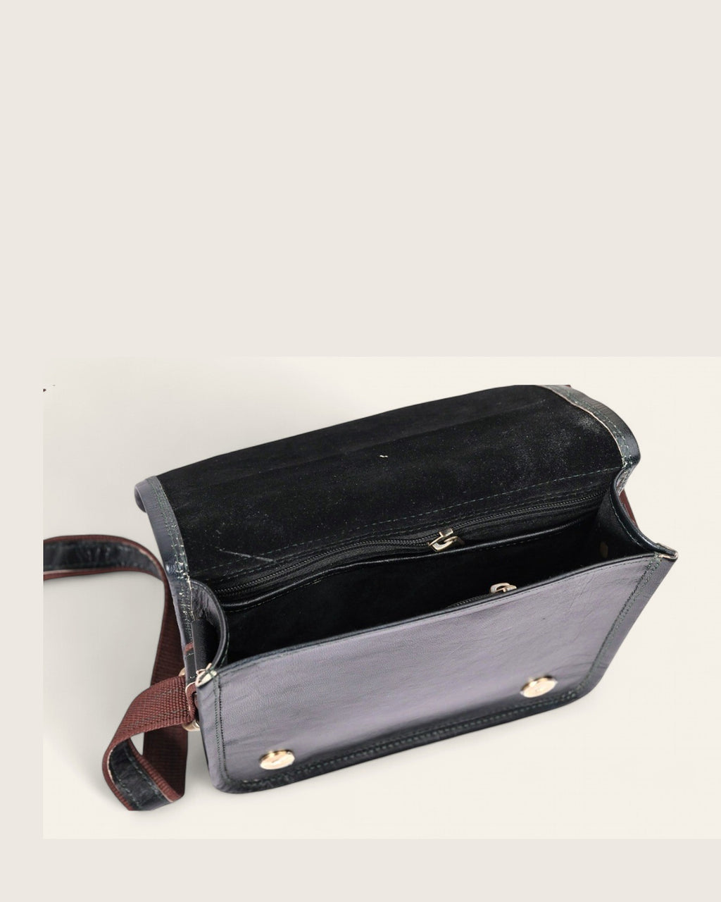 The Jaisalmer Sling in Dark Olive - open flap showing the interior