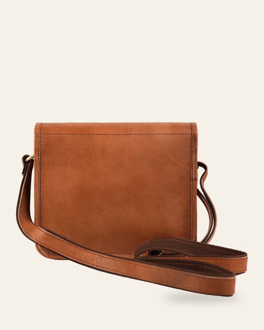 The Jaisalmer Sling in Tan — back view with adjustable crossbody strap