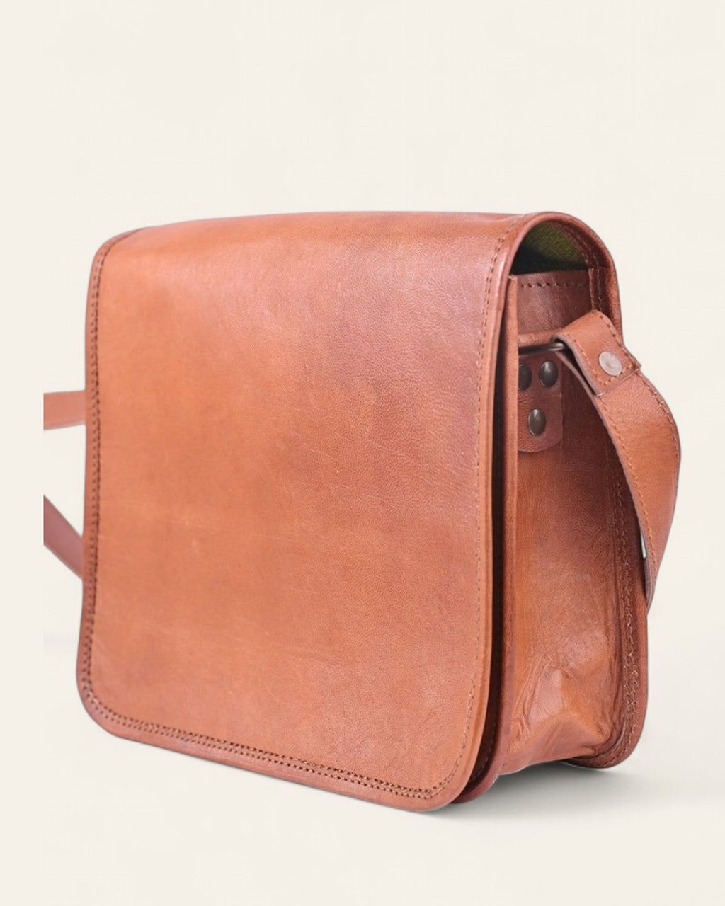 The Mandore Sling — angled view showing the seamless full flap and strap