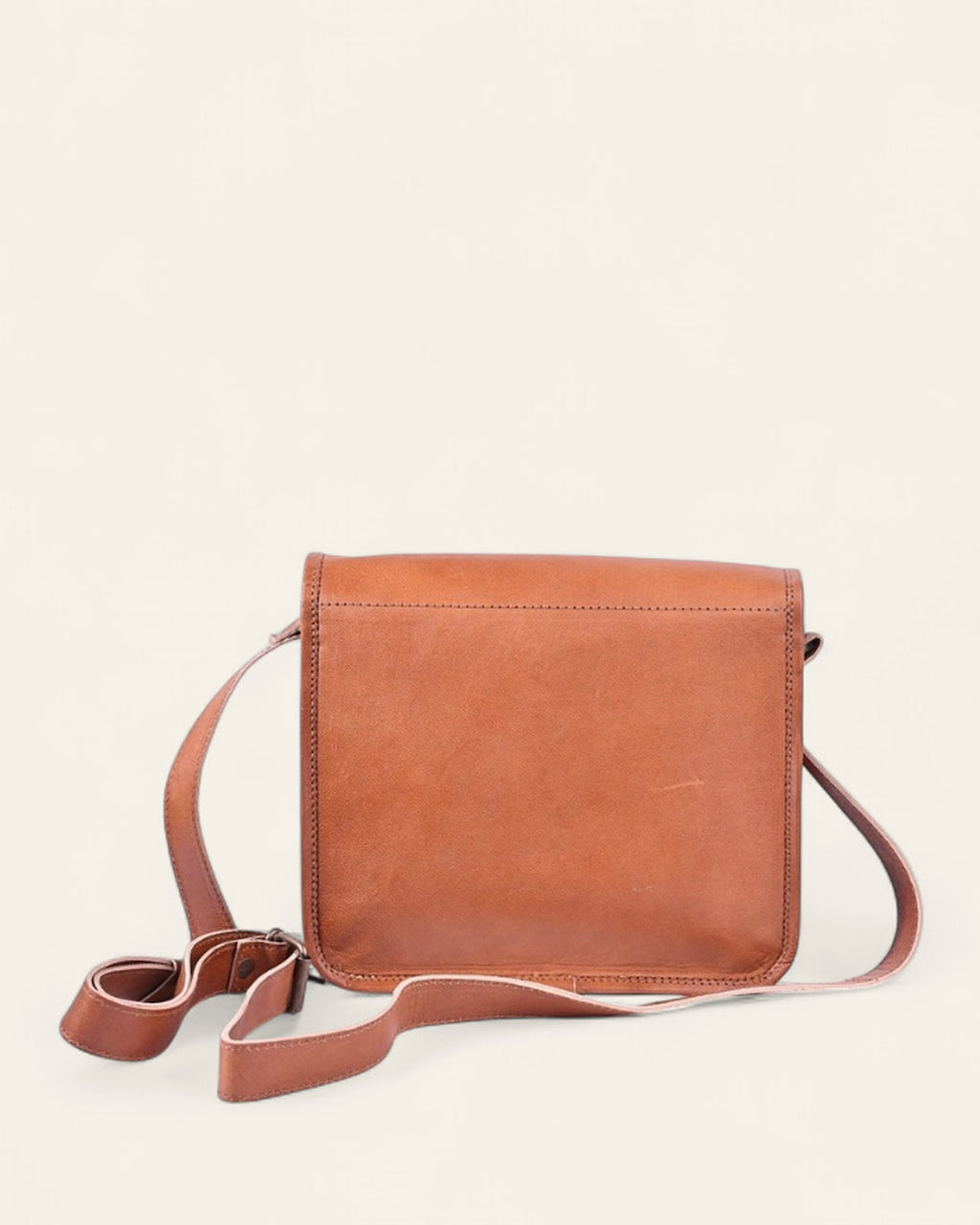The Mandore Sling — back view with the long adjustable leather strap