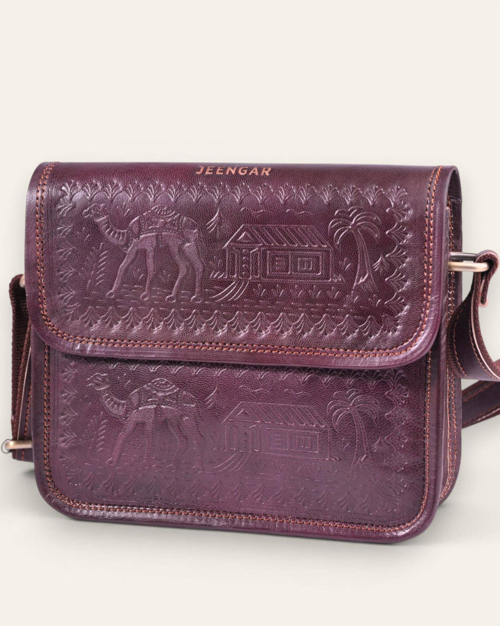 The Pushkar Sling — hand-embossed real leather sling bag, front view