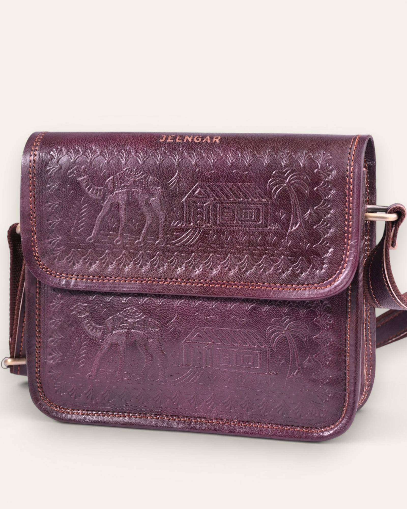 The Pushkar Sling — hand-embossed real leather sling bag, front view