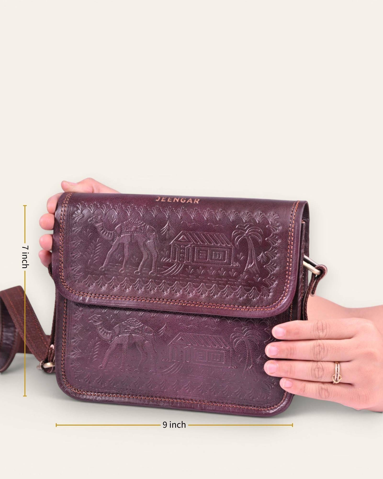 The Pushkar Sling — hand-embossed real leather sling bag, side profile