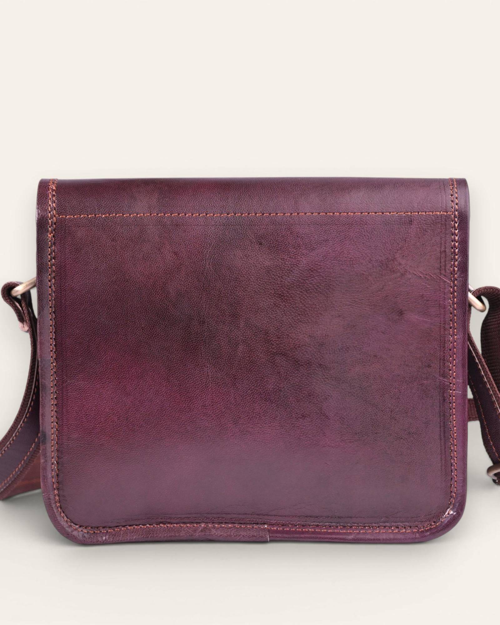 The Pushkar Sling — hand-embossed real leather sling bag, open interior