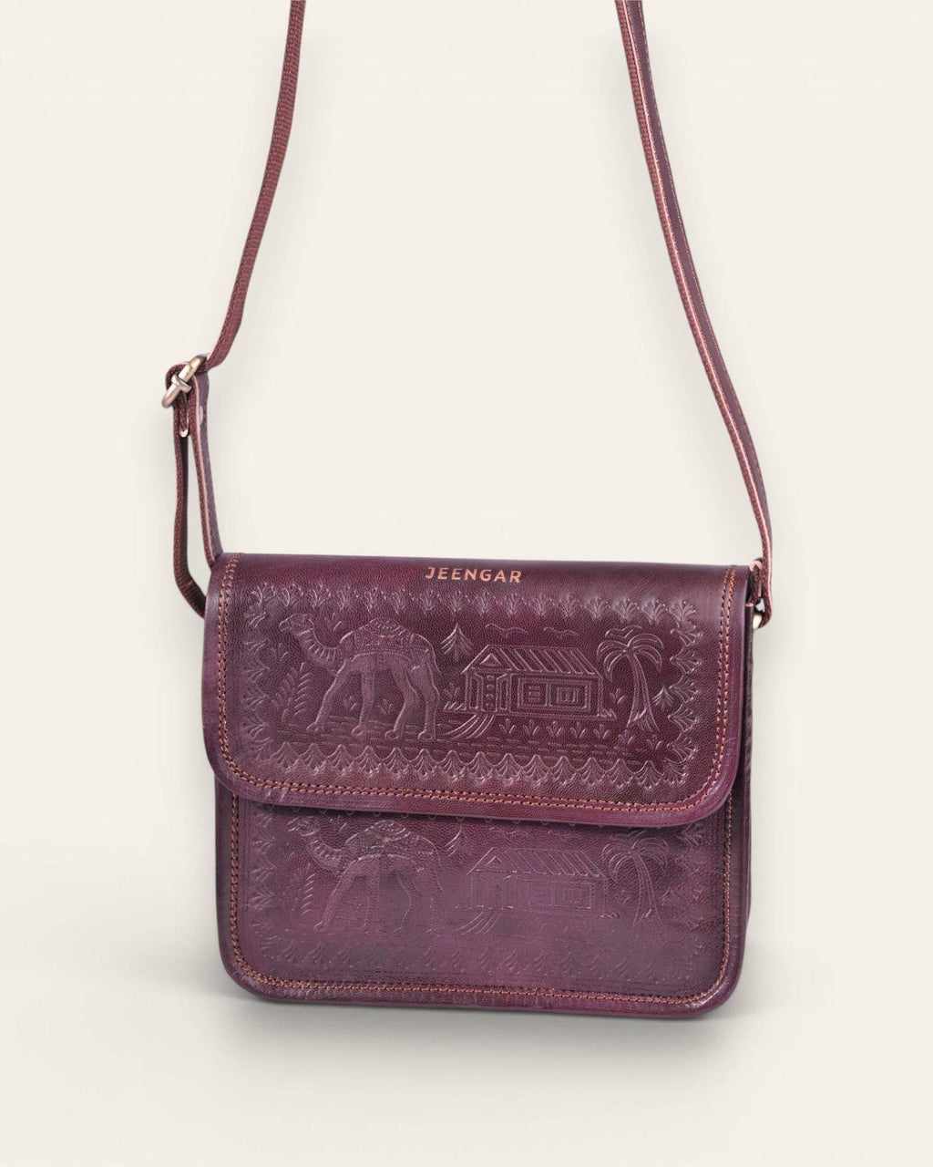 The Pushkar Sling — hand-embossed real leather sling bag, back view