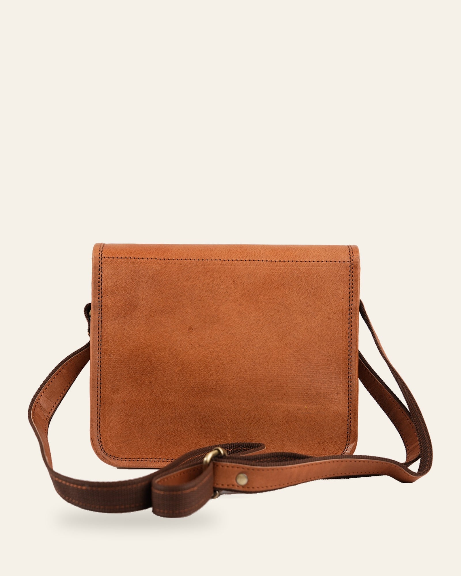 The Pushkar Sling in Tan — back view with adjustable crossbody strap