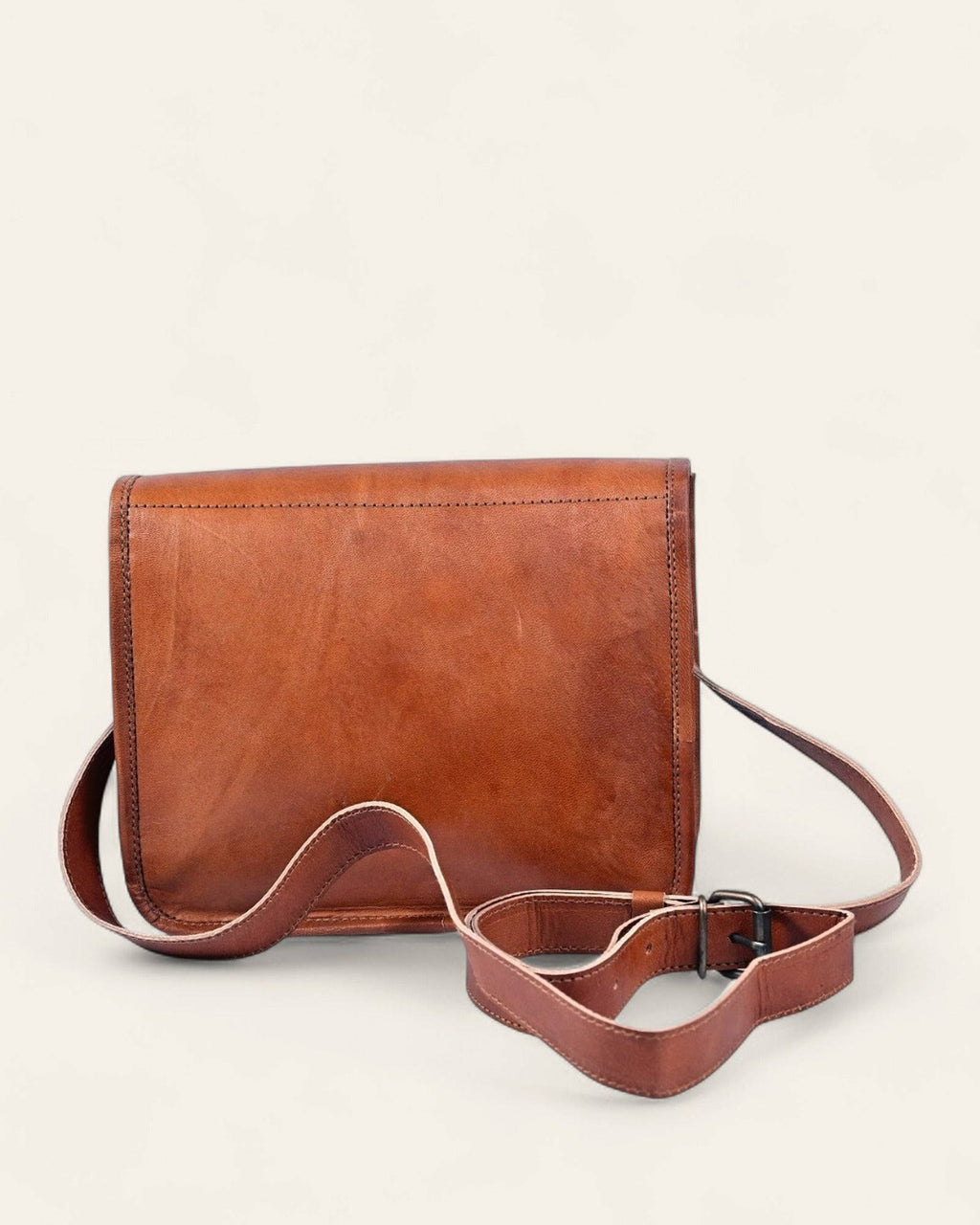 The Runicha Sling — side view showing the slim profile and adjustable strap