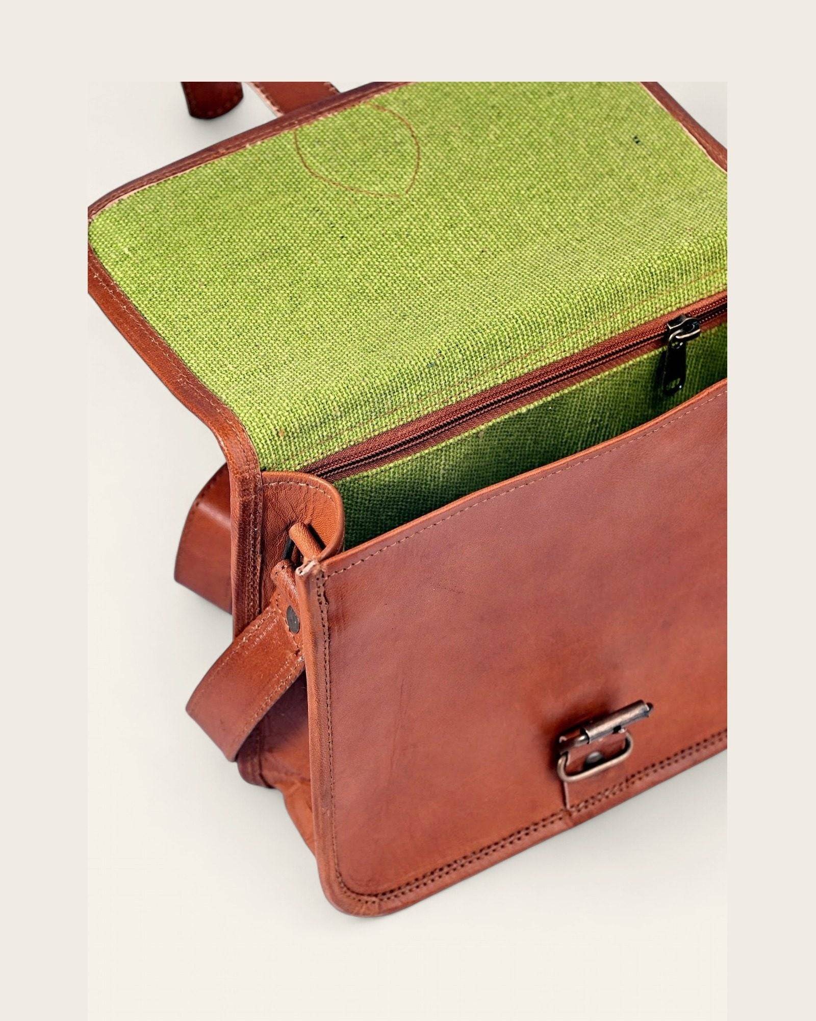 The Runicha Sling — open, showing the green canvas-lined interior