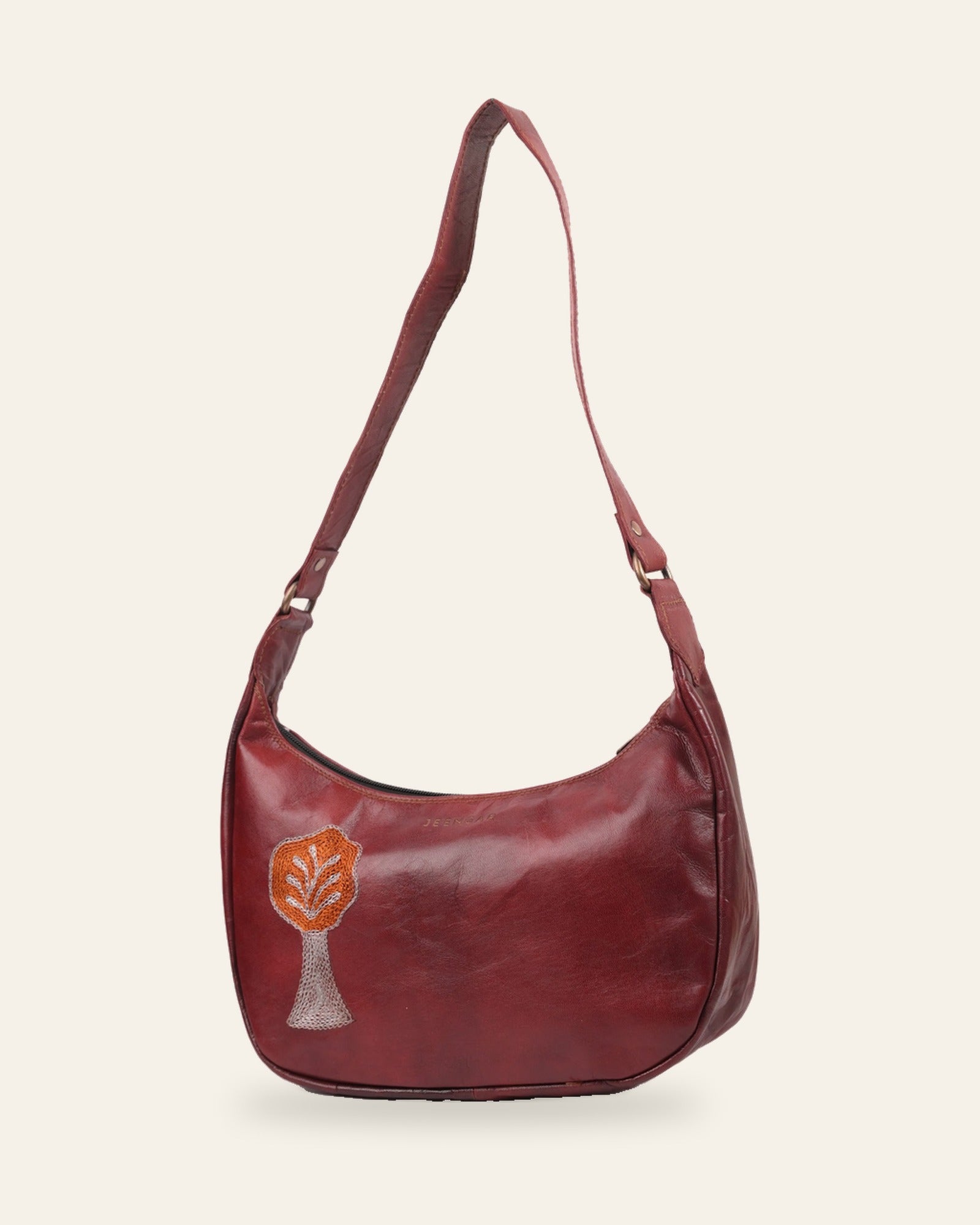 The Kashida Shoulder Bag — Padmini Tree of Life motif in Cherry, hand-embroidered real leather, front view