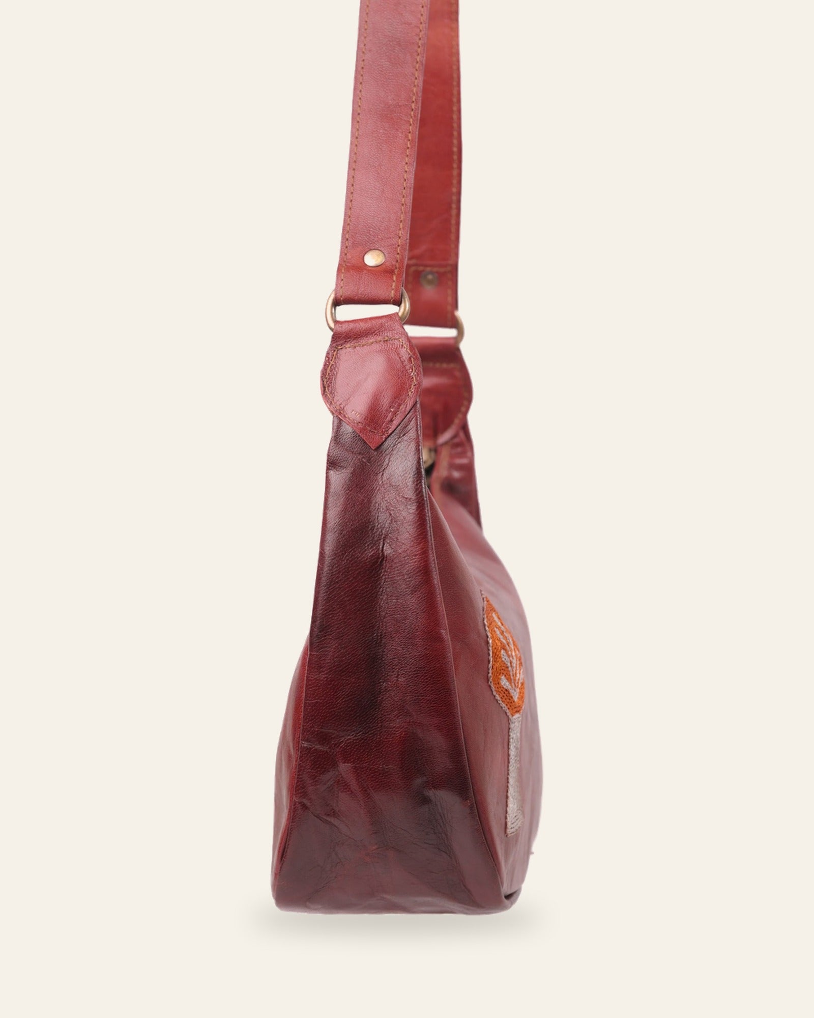 The Kashida Shoulder Bag — Cherry side profile