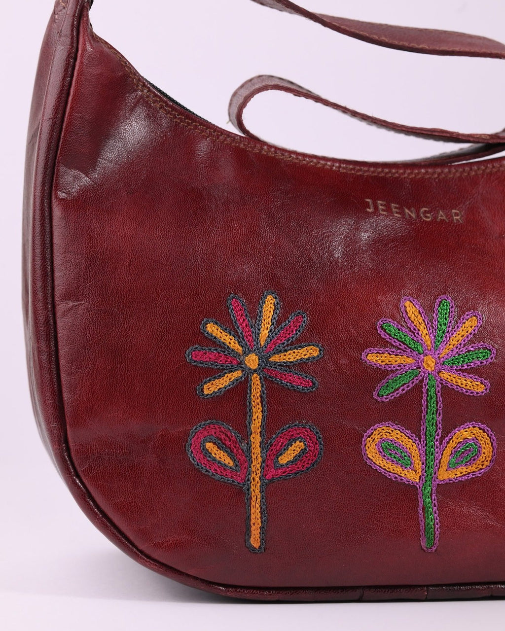 The Kashida Shoulder Bag — closeup of the hand-embroidered Sanyogita flowers