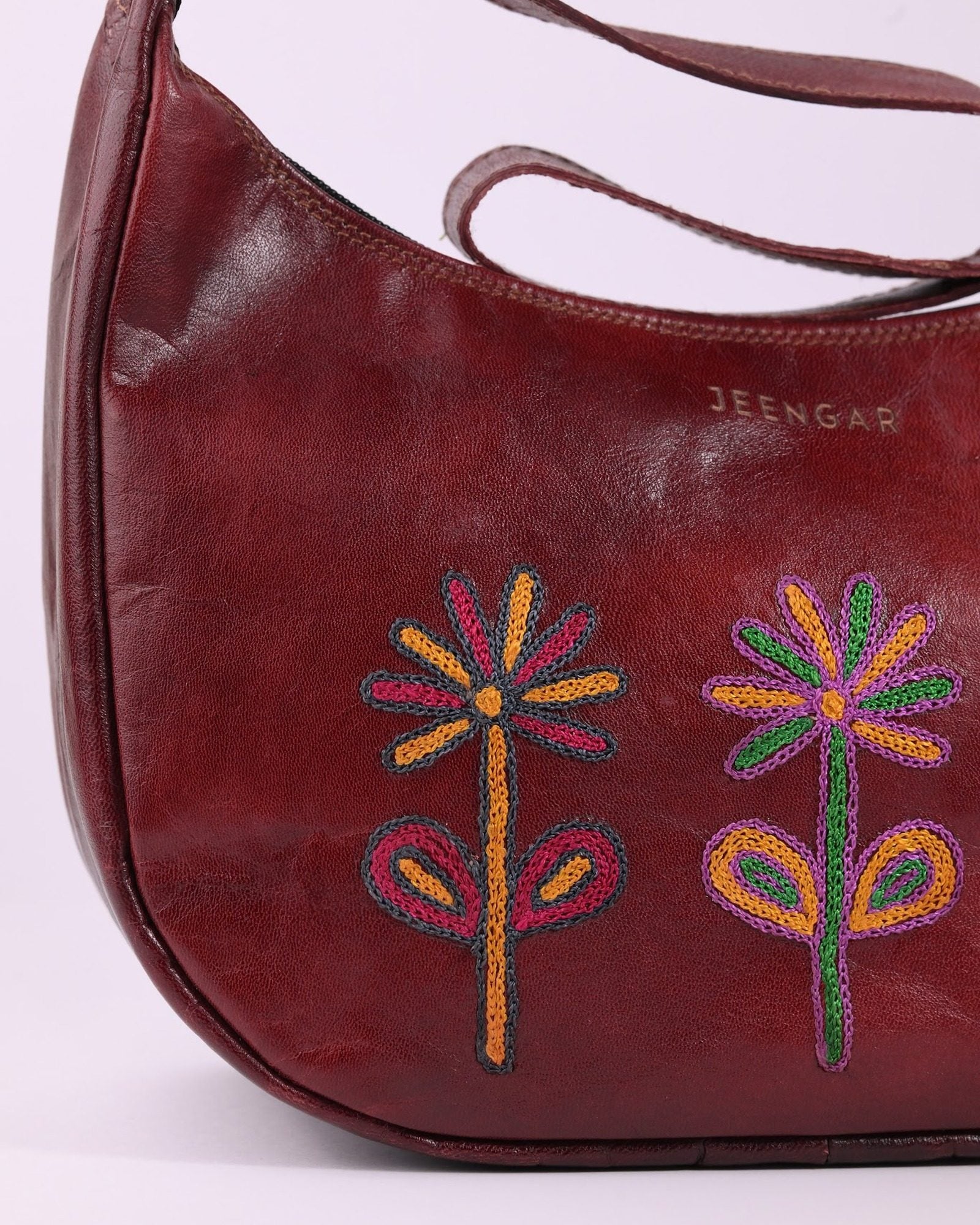 The Kashida Shoulder Bag — closeup of the hand-embroidered Sanyogita flowers