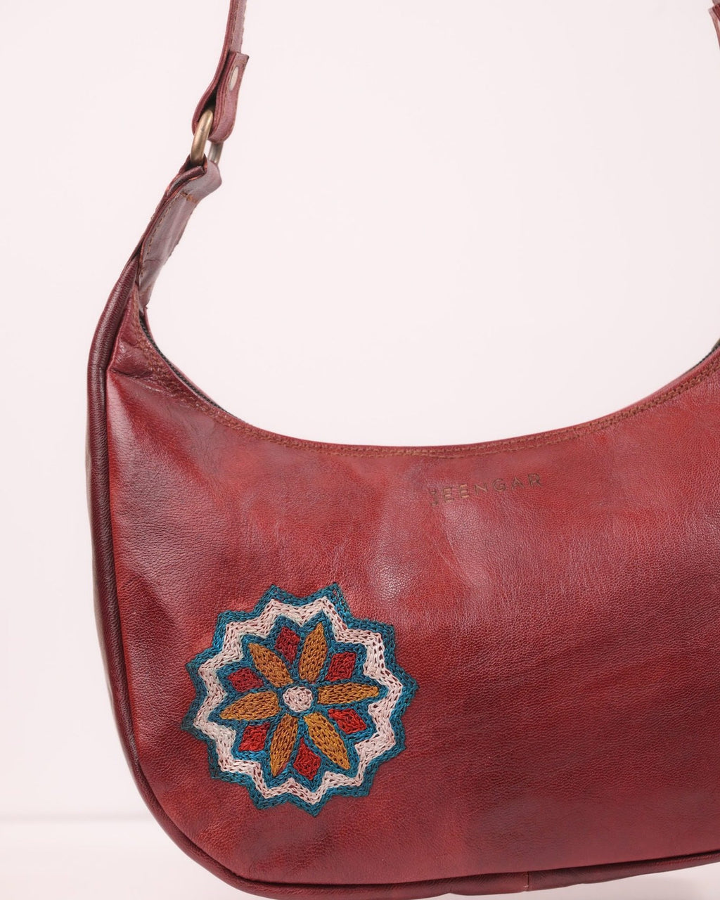 The Kashida Shoulder Bag — closeup of the hand-embroidered Hadi mandala medallion