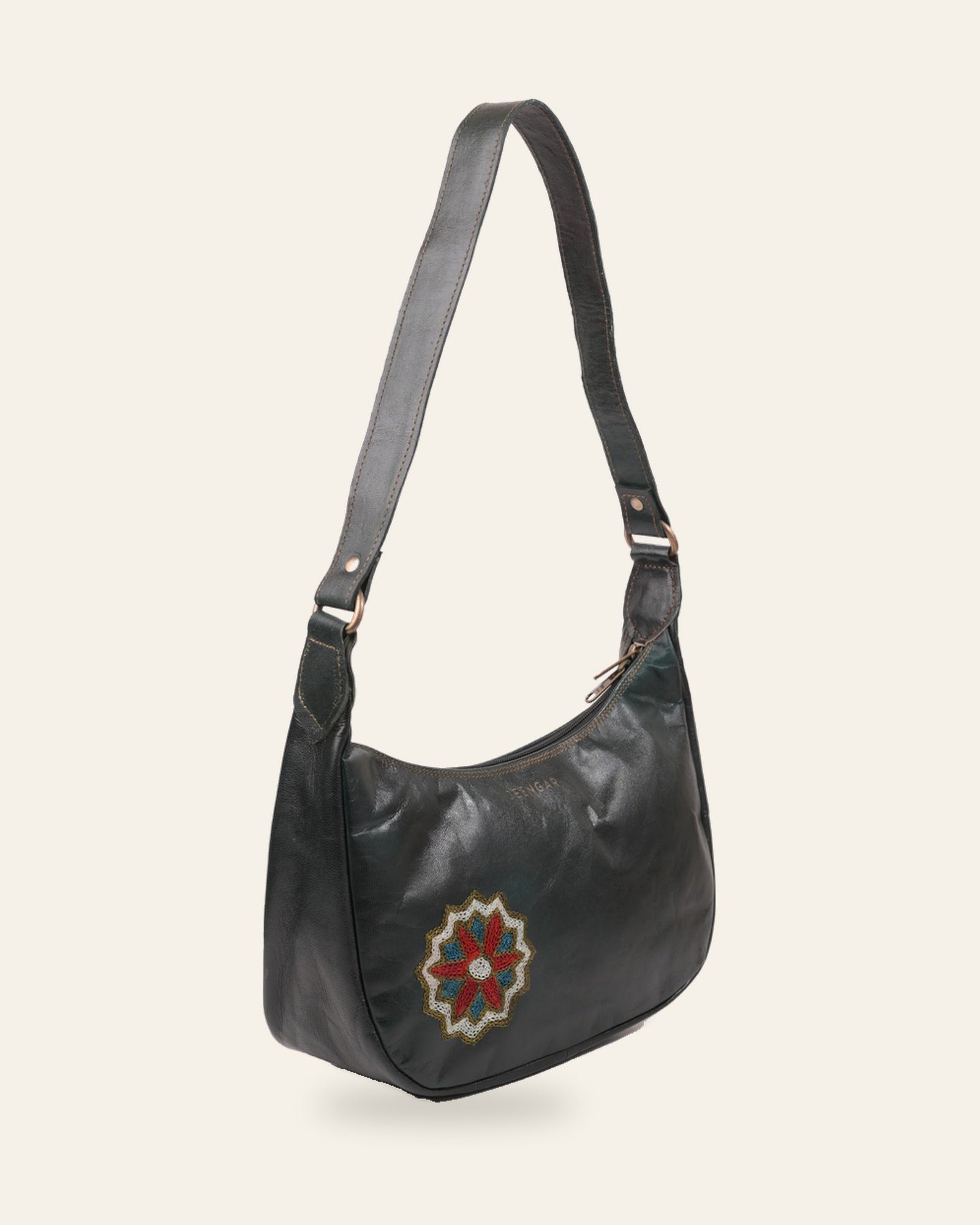 The Kashida Shoulder Bag — Hadi mandala medallion in Dark Olive, hand-embroidered real leather, front view