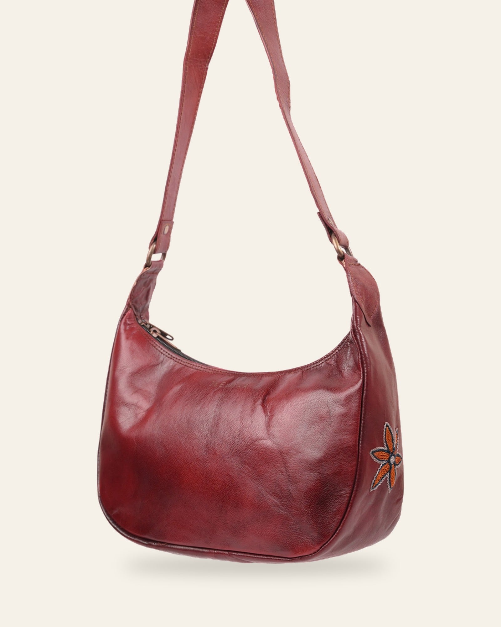 The Kashida Shoulder Bag — Moomal star-flower motif in Cherry, hand-embroidered real leather