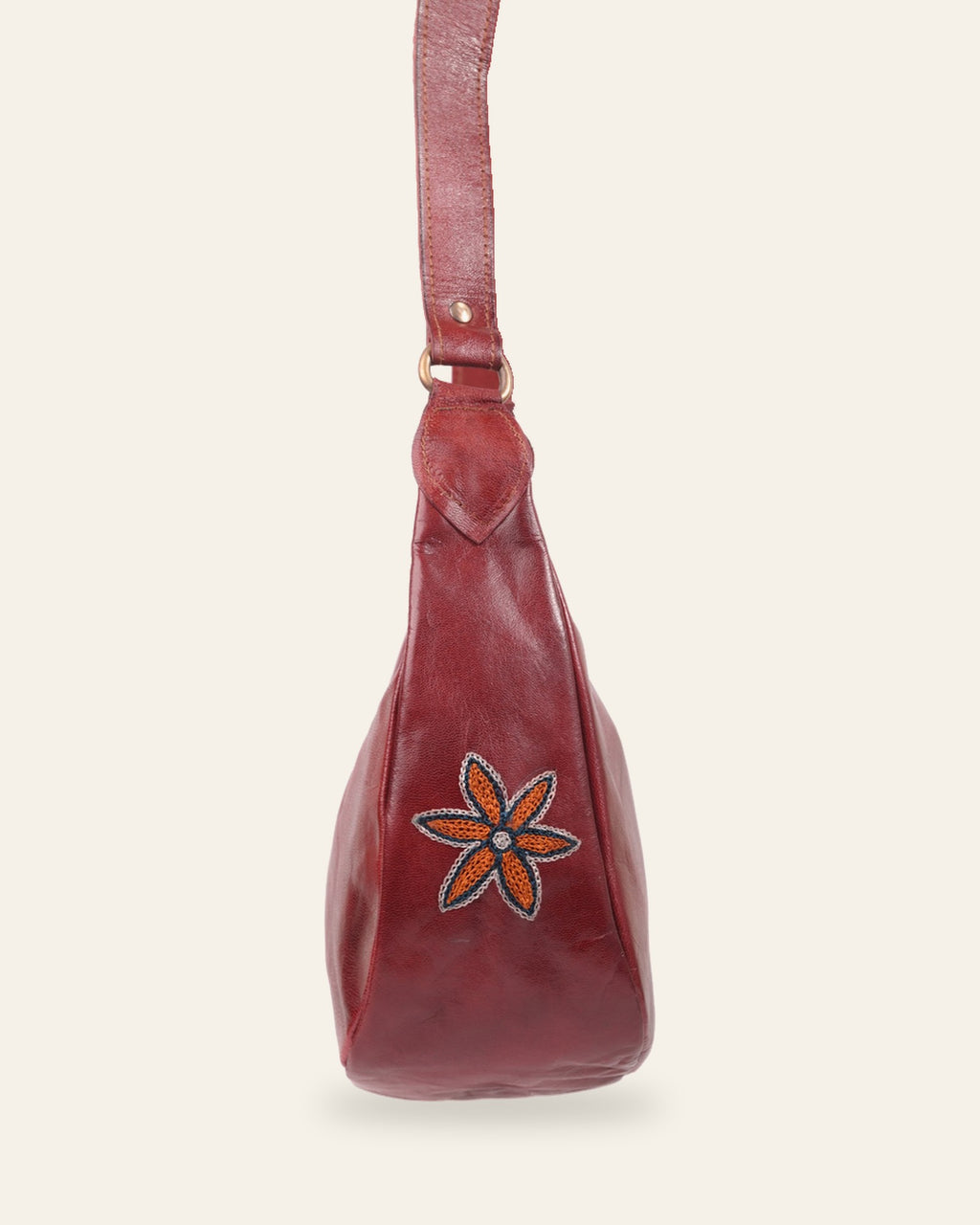 The Kashida Shoulder Bag — Cherry side profile with Moomal motif