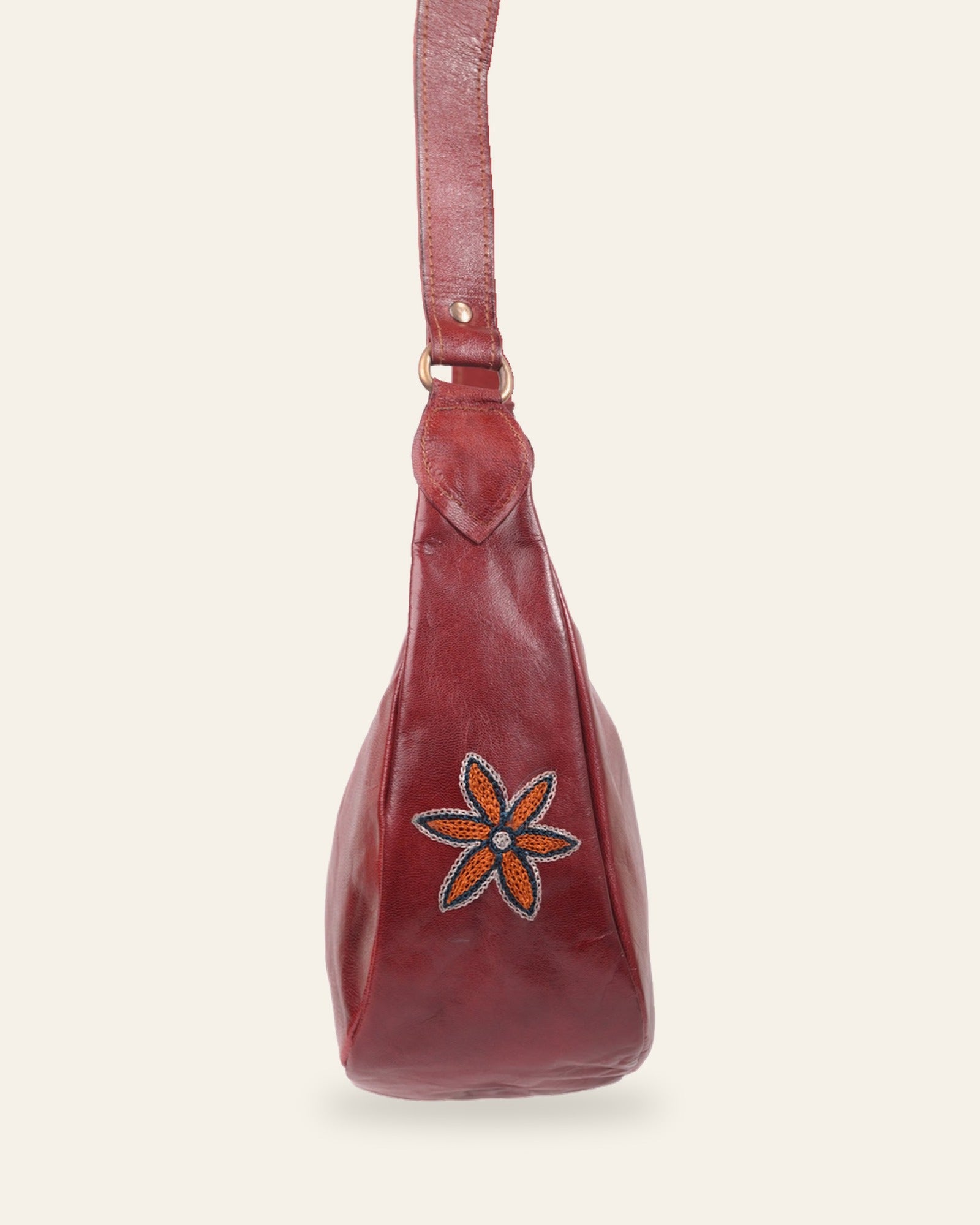 The Kashida Shoulder Bag — Cherry side profile with Moomal motif