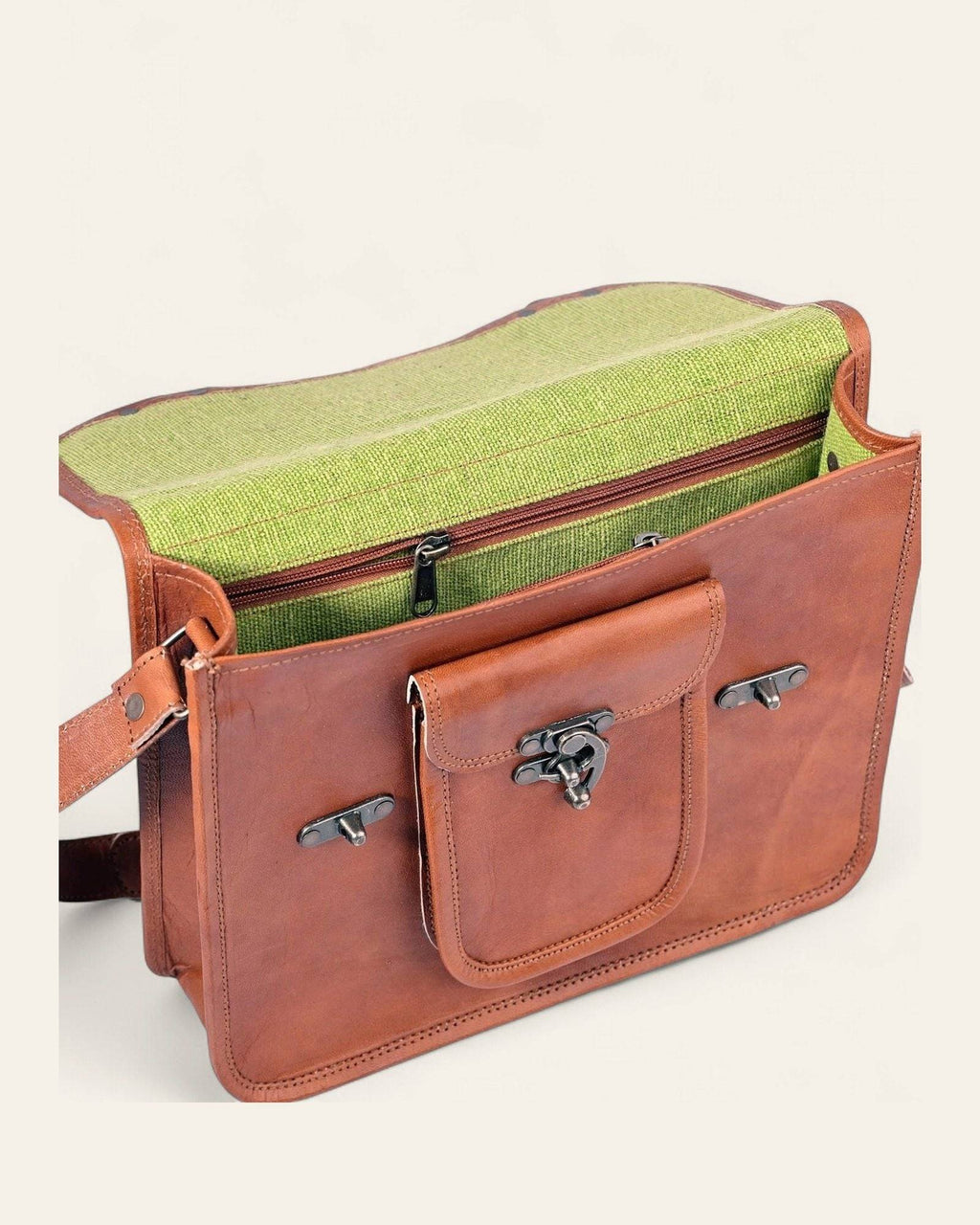 The Malani Messenger — open, showing the green canvas-lined interior