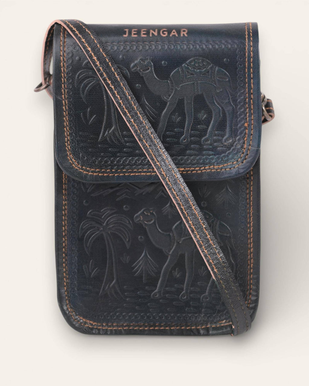 The Nagaur Sling in Dark Olive — hand-embossed leather mobile sling, front view