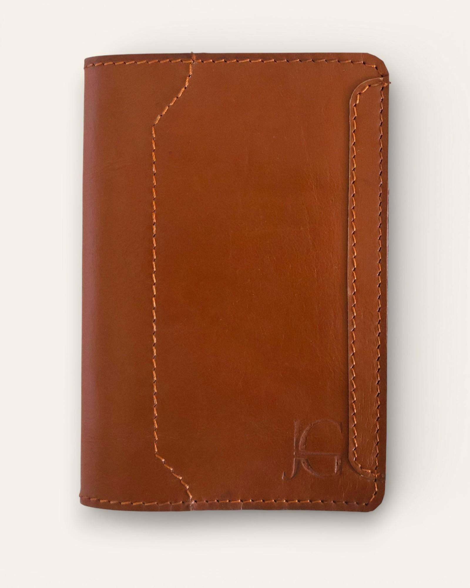 The Banjara Passport Holder — handcrafted tan leather passport cover by Jeengar, front view