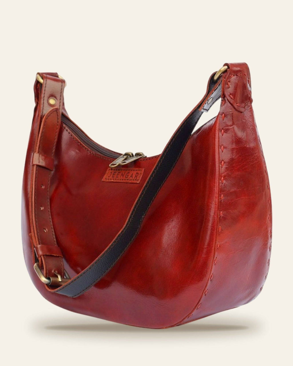 The Ranisar Shoulder Bag in Cherry — back view with adjustable strap