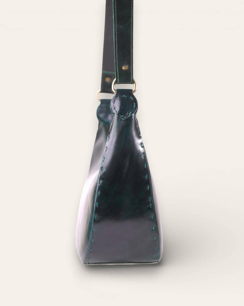 The Ranisar Shoulder Bag in Dark Olive — hand-stitching detail