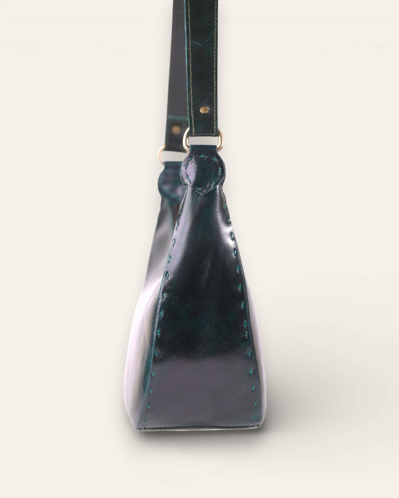 The Ranisar Shoulder Bag in Dark Olive — hand-stitching detail