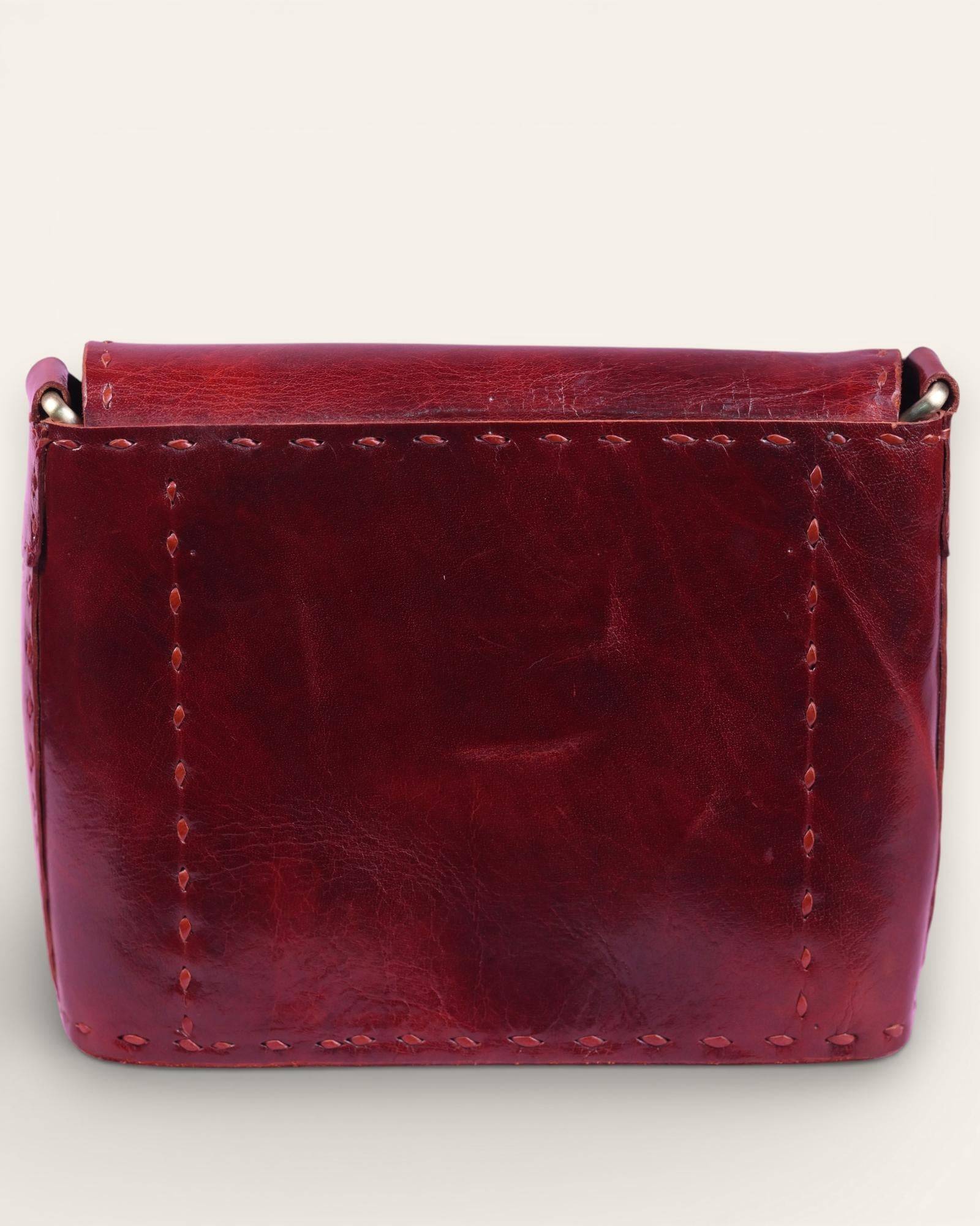 The Beawar Sling in Cherry — prominent saddle-stitch detail
