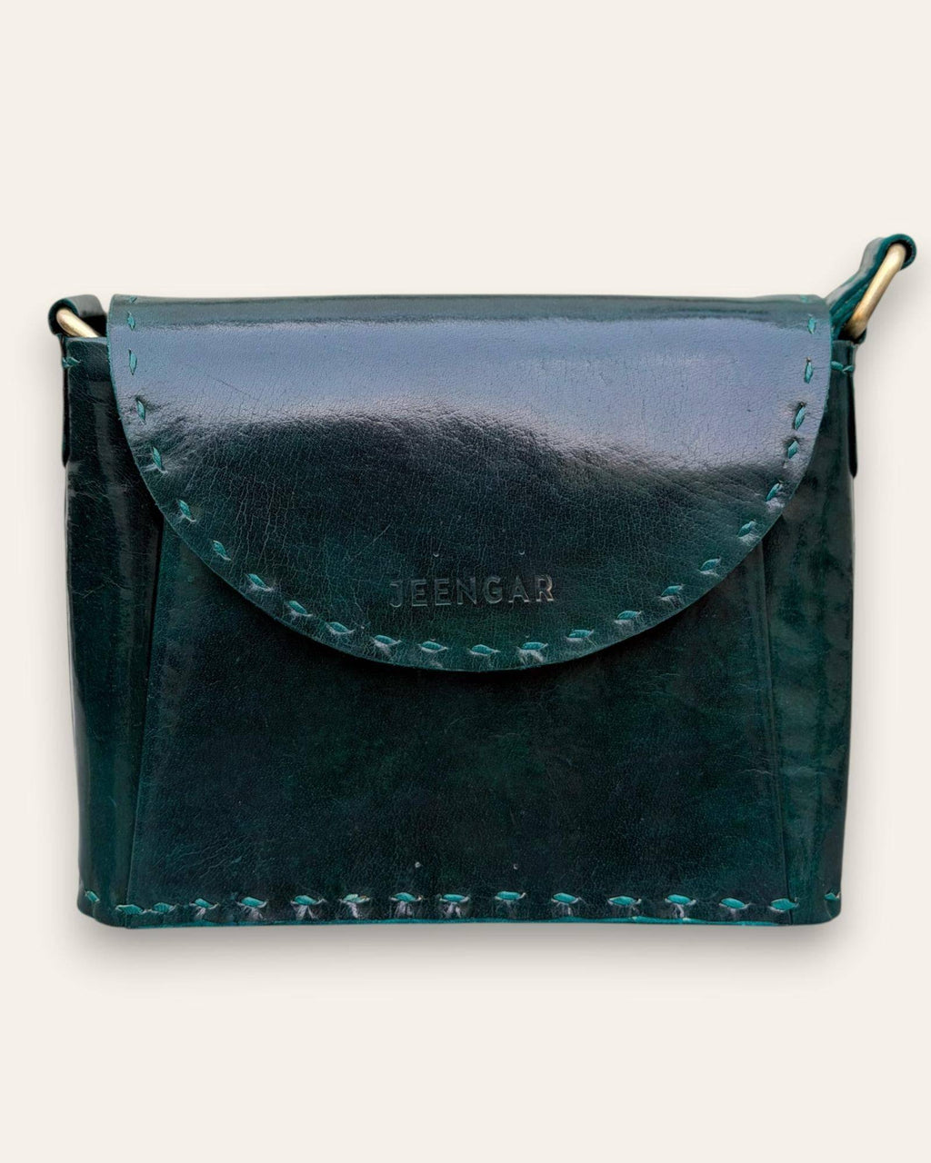 The Beawar Sling in Dark Olive — hand-stitched leather crossbody, front view