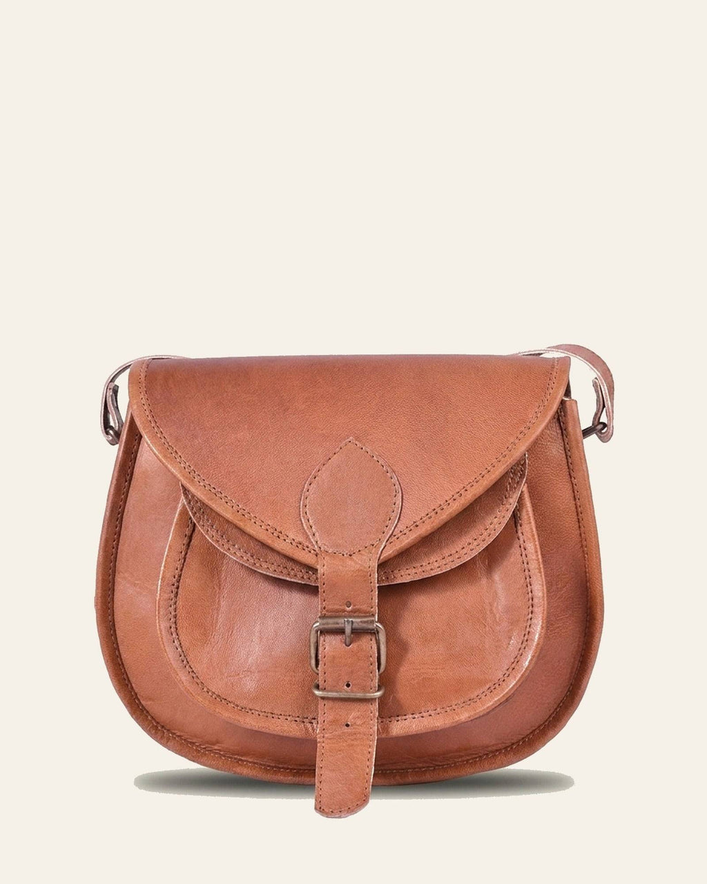 The Marwari Sling in Tan — front with pocket and buckle