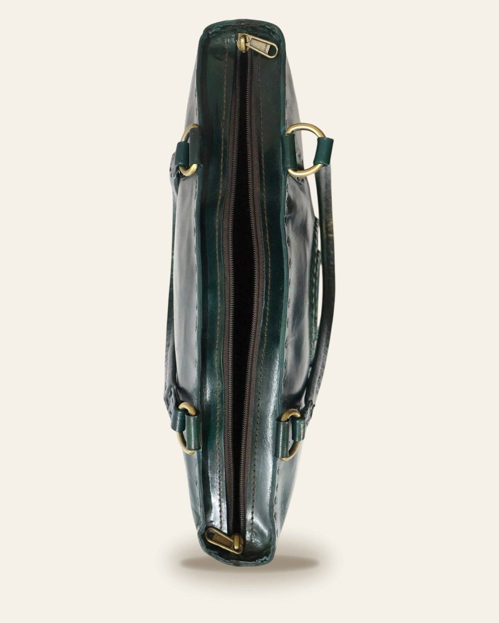 The Rambagh Tote — zip-top closure and slim profile with brass hardware