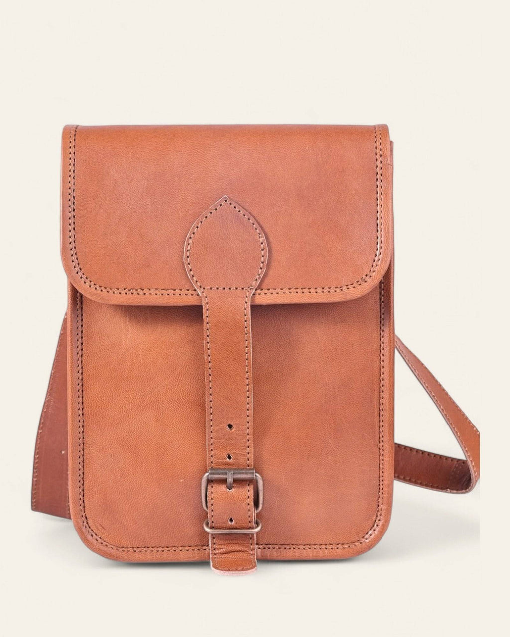 The Amer Sling in Tan — tall handcrafted leather crossbody by Jeengar, front view